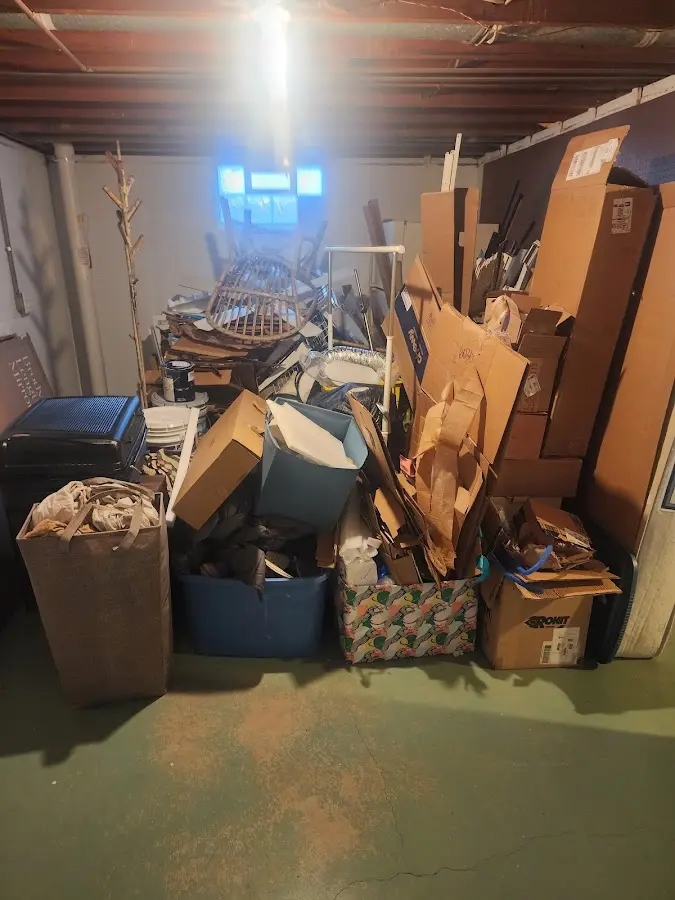 Roll-off dumpster container at job site for 20 Yard Dumpster Rental in Evans